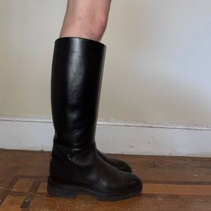 Khaite knee high black leather riding boots